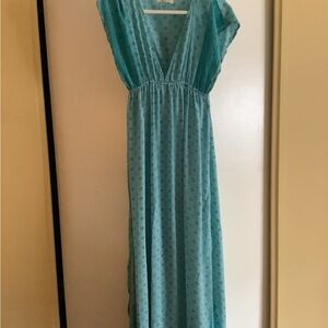 Beautiful blue silk like dress, perfect for summer weddings or casual dinners.